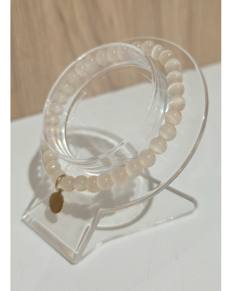 Bransoletka Olivia By o la la...! transparentna beżowa ze złotym medalikiem